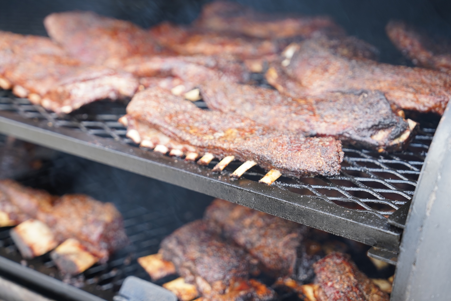 short ribs and rack of ribs on the grill